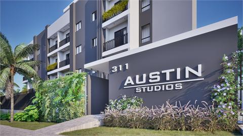 Fachada do Austin Studios com o letreiro 311