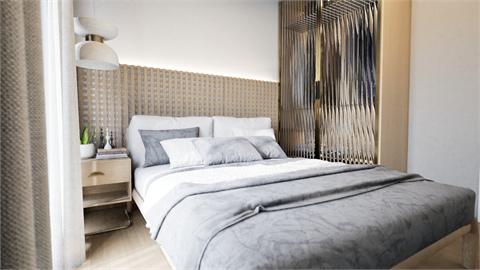 Detalhe da cama e da marcenaria de um studio